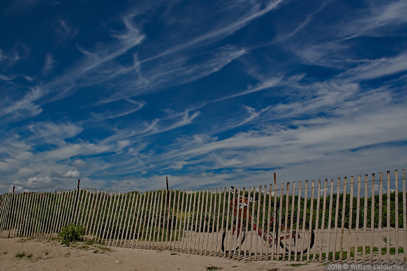 Bicycle on the Fence at the Beach by William Latournes