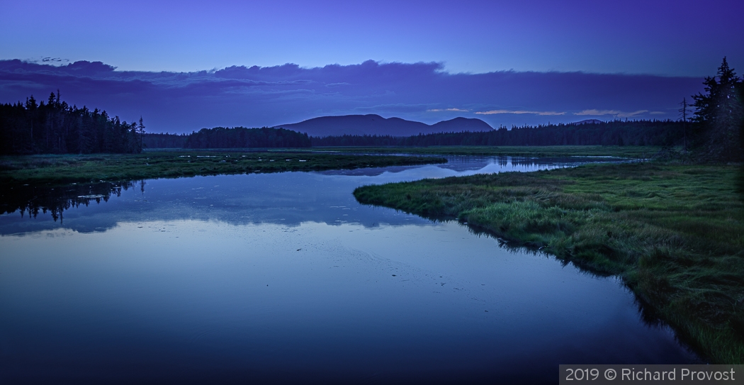 Blue lite over Bass Harbor, ME by Richard Provost