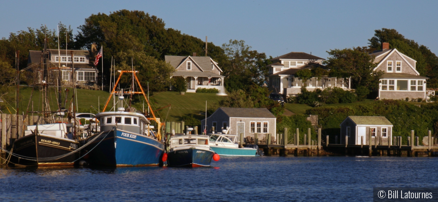 Boats And Cottages by Bill Latournes