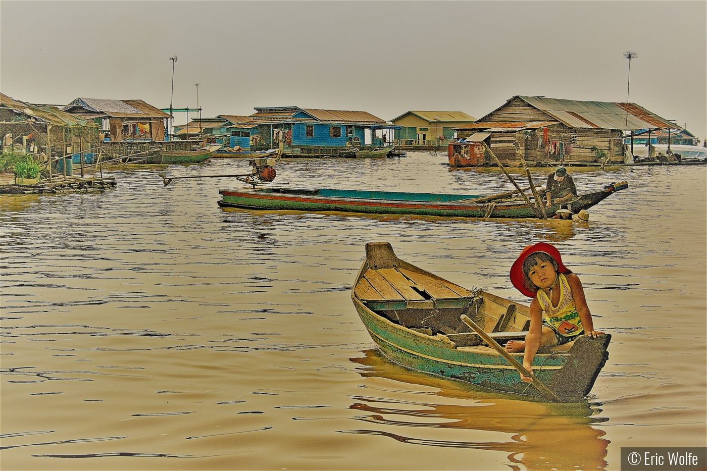 Child Adrift in Floating Village by Eric Wolfe