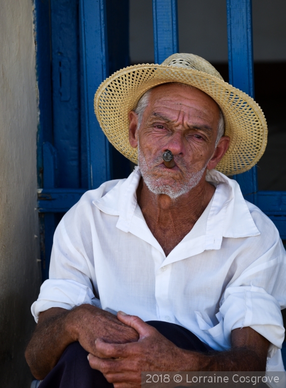 Enjoying a Cuban Cigar in Trinidad by Lorraine Cosgrove