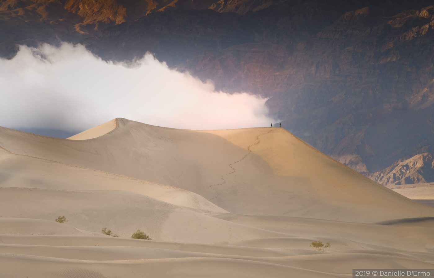 Hiking with a cloud overhead, Death Valley by Danielle D'Ermo