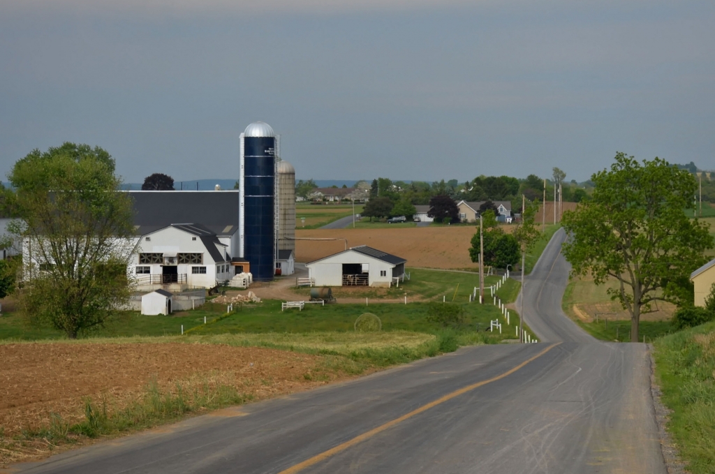 land of the amish by Ginny Thibodeau