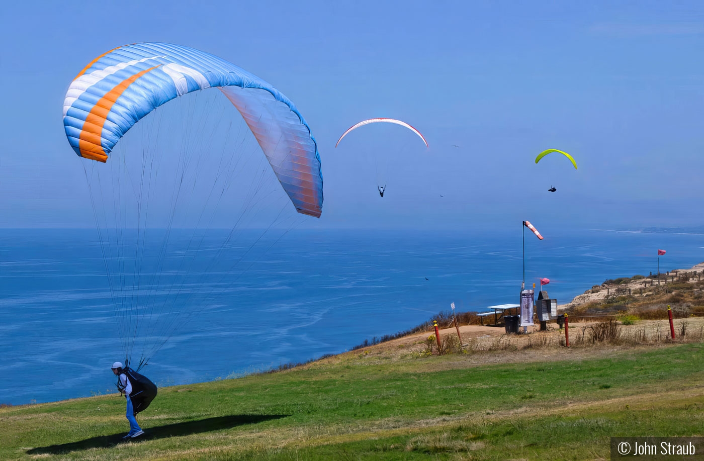 Paragliding Away at Torre Pines by John Straub