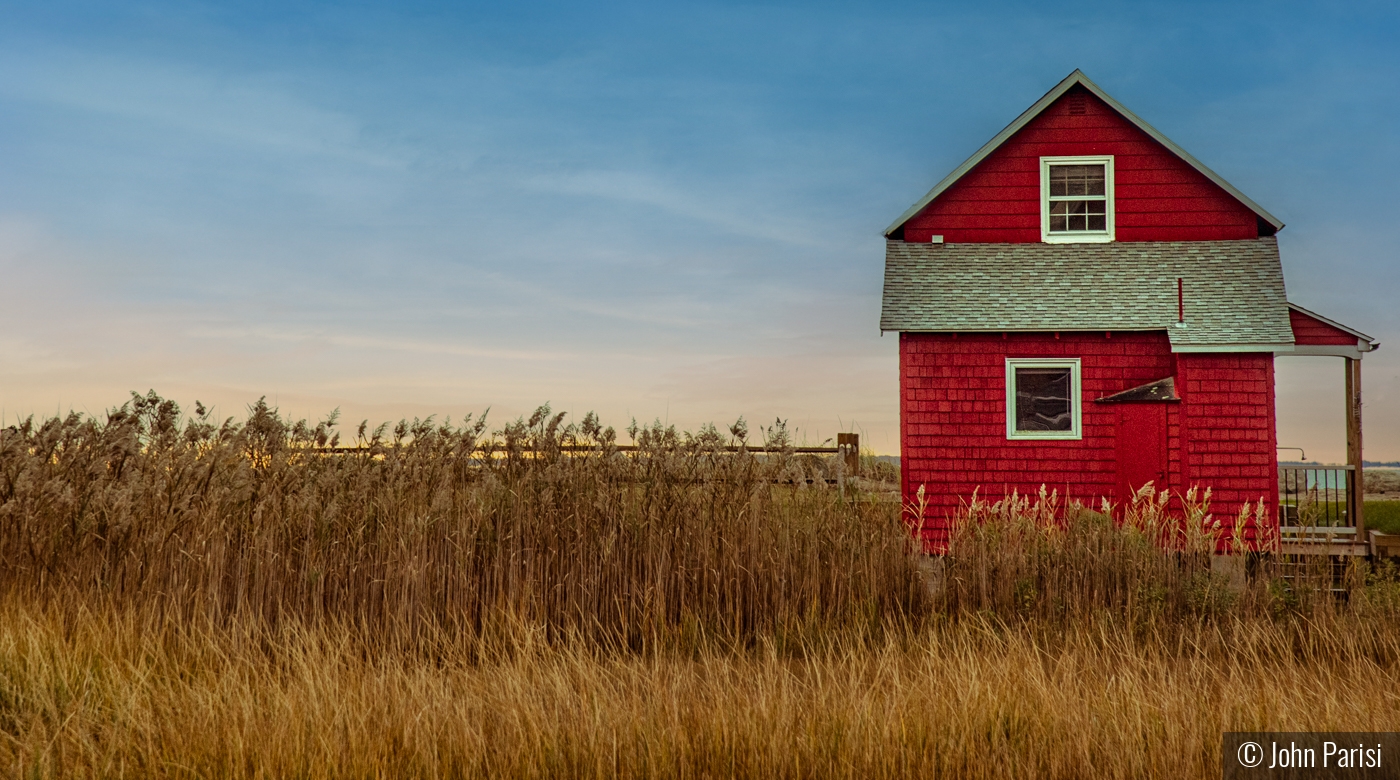 red cottage by John Parisi