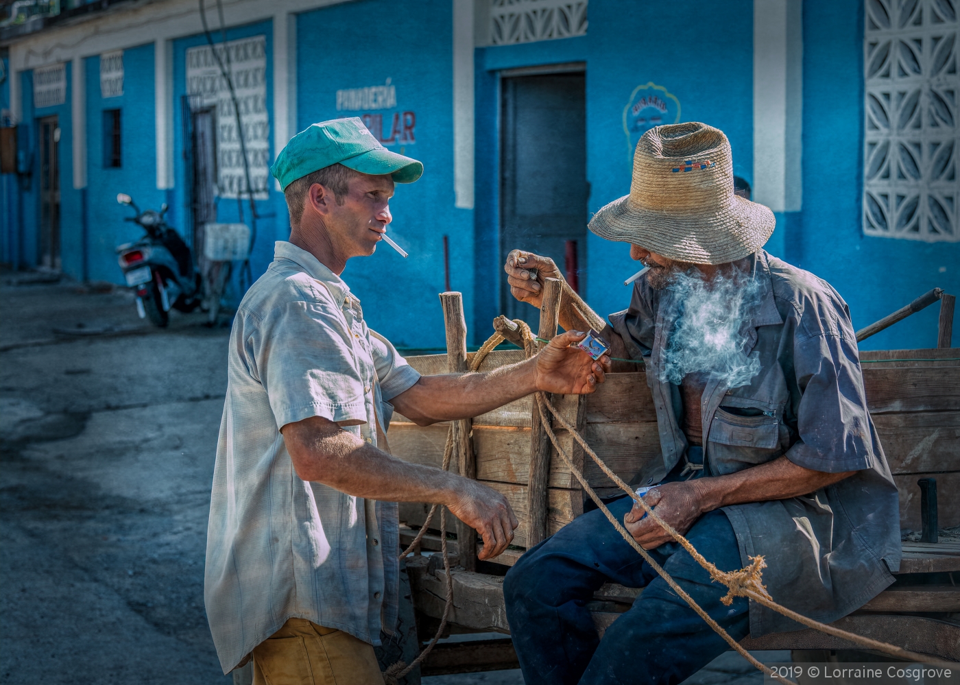 Sharing a Light in Vinales by Lorraine Cosgrove