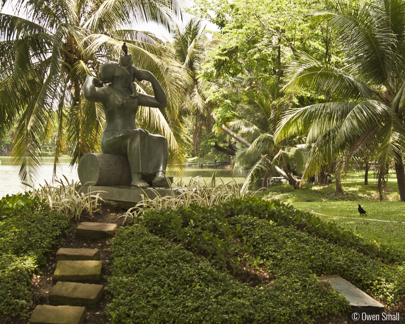 Statue in Lumpini Park Bangkok, Thailand by Owen Small