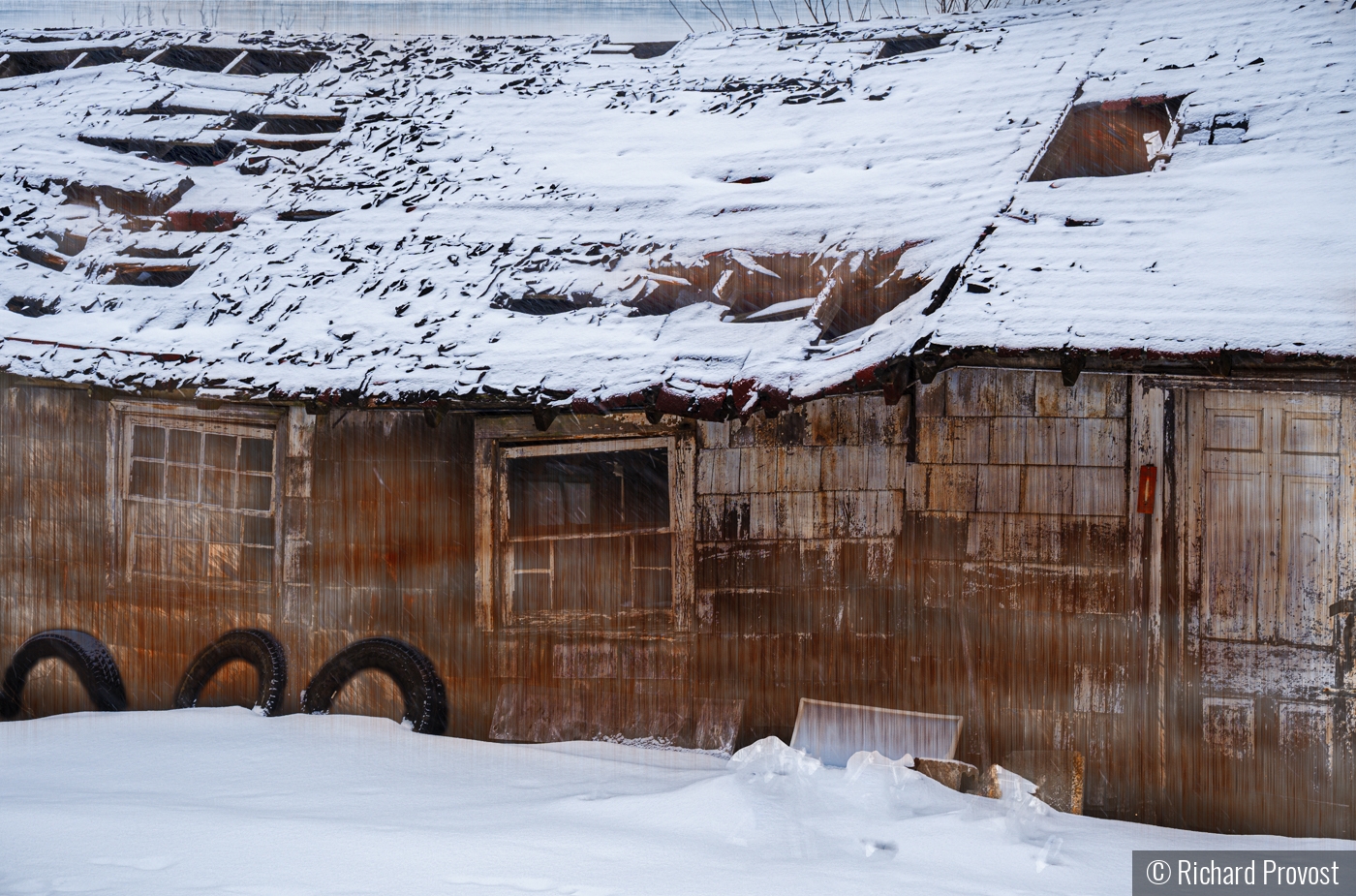 Wades barn in snow by Richard Provost