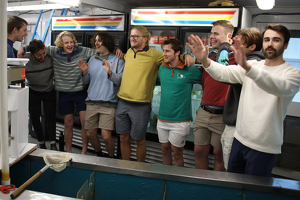 Acapella Singers Walk Into Fish Market - Photo by Bill Latournes