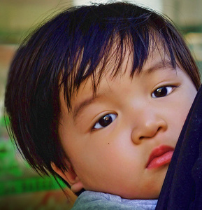 Baby in Backpack - Photo by Alene Galin