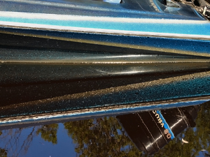 Boat Reflection - Photo by Bill Latournes