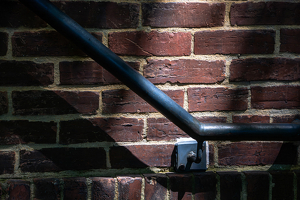 Brick and Railing - Photo by Alene Galin