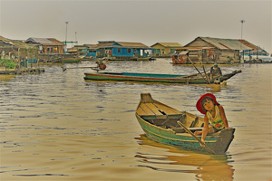 Child Adrift in Floating Village - Photo by Eric Wolfe