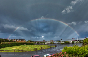 Coastal Storm with Rainbow - Photo by Ben Skaught