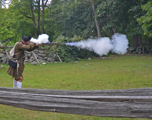 Concord Marksman Firing His Musket - Photo by Louis Arthur Norton