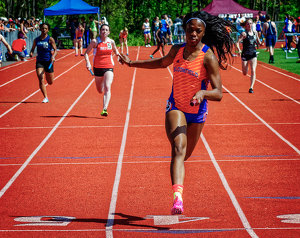 Crossing the Finish Line - Photo by John McGarry