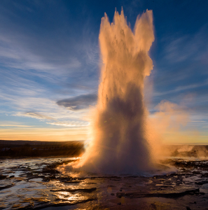 Geyser at sunrise - Photo by Richard Provost