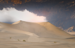 Hiking with a cloud overhead, Death Valley - Photo by Danielle D'Ermo