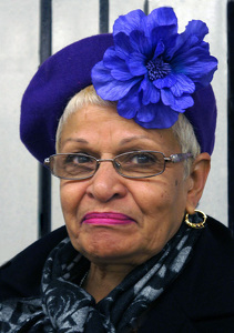 Lady with Blue Flower Hat - Photo by Alene Galin