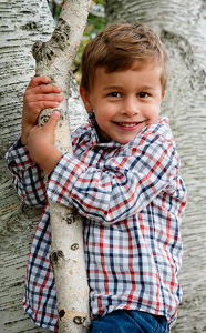 Max Climbing a Tree - Photo by John McGarry