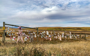 Memorial of Children Bear Doll Fence in Dupuyer, MT - Photo by Quannah Leonard