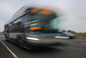 Moving Bus - Photo by Bill Latournes