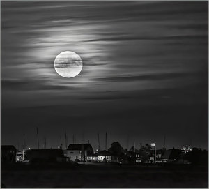 Shrouded Supermoon Rising - Photo by John Straub