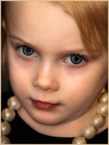 Sting of pearls and a black dress - Photo by Frank Zaremba MNEC