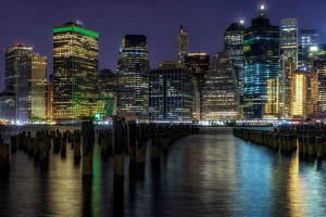 Tranquil Setting, Aged Pilings, Modern Manhattan - Photo by Bill Payne